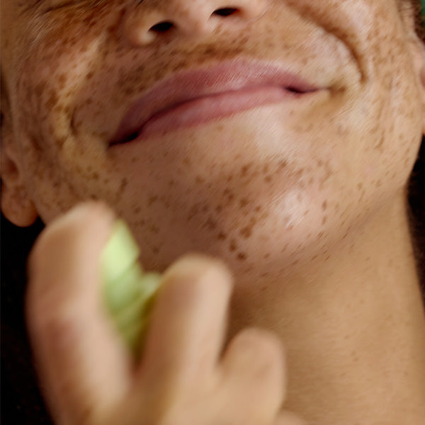 Person applying The Everything is Fine Balm to textured skin