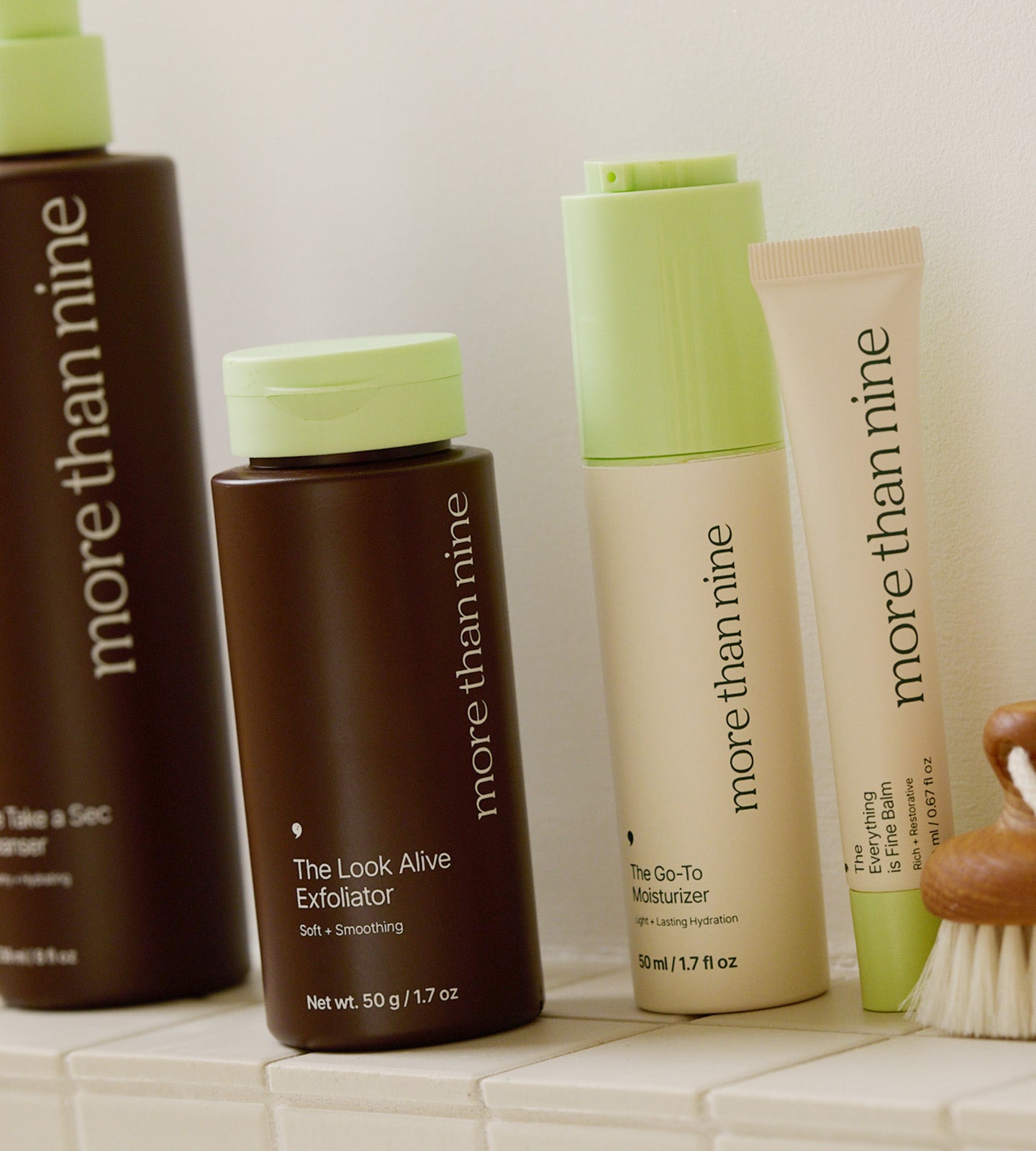 More Than Nine skincare routine bottles and tubes