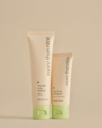 The Take Me With You Set travel cleanser and moisturizer on a neutral background