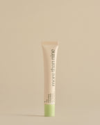 The Everything is Fine Balm tube on a neutral background