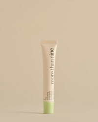 The Everything is Fine Balm tube on a neutral background