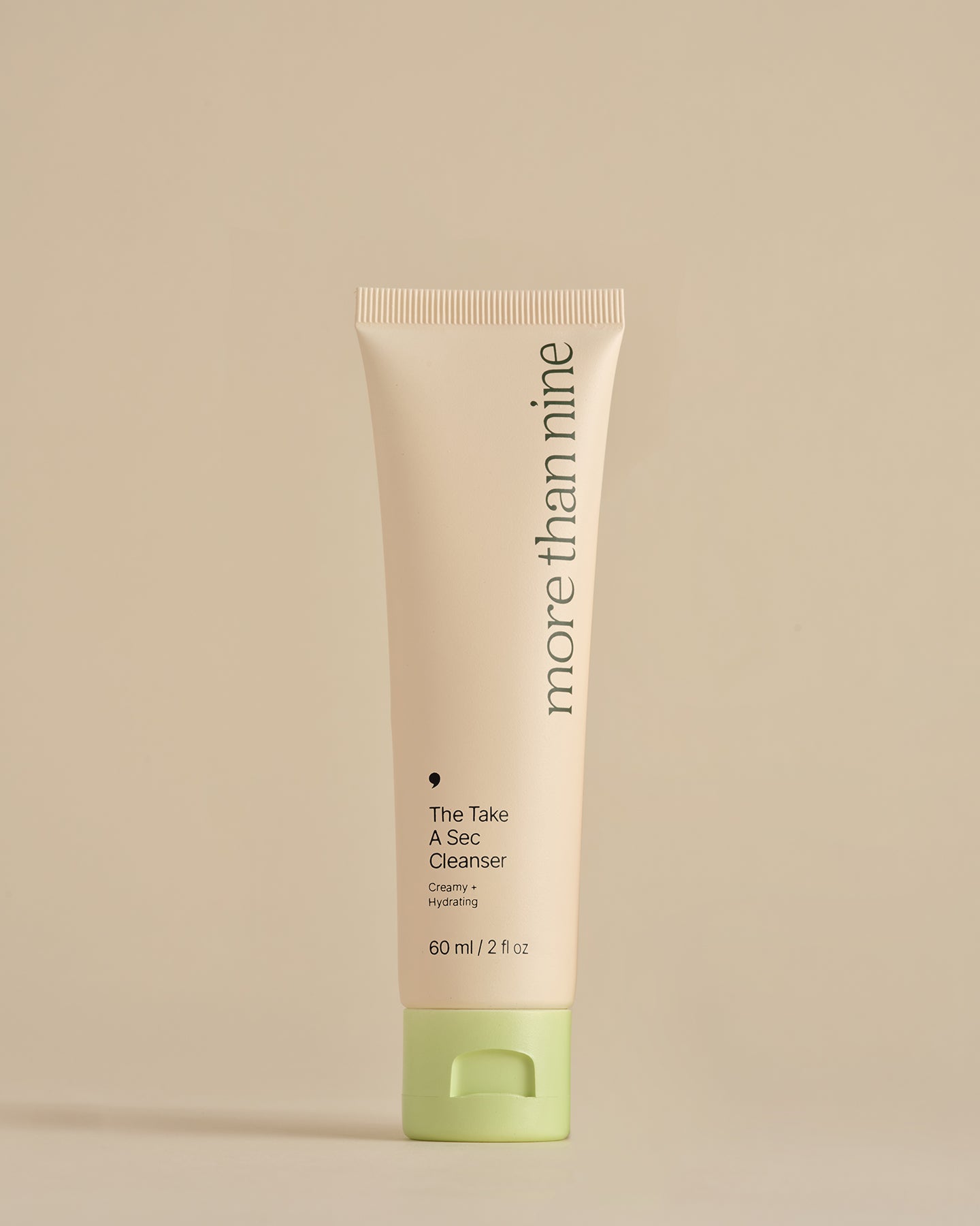 Travel-size The Take a Sec Cleanser bottle on a neutral background