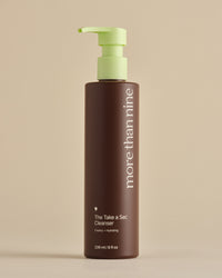 The Take a Sec Cleanser bottle on a neutral background