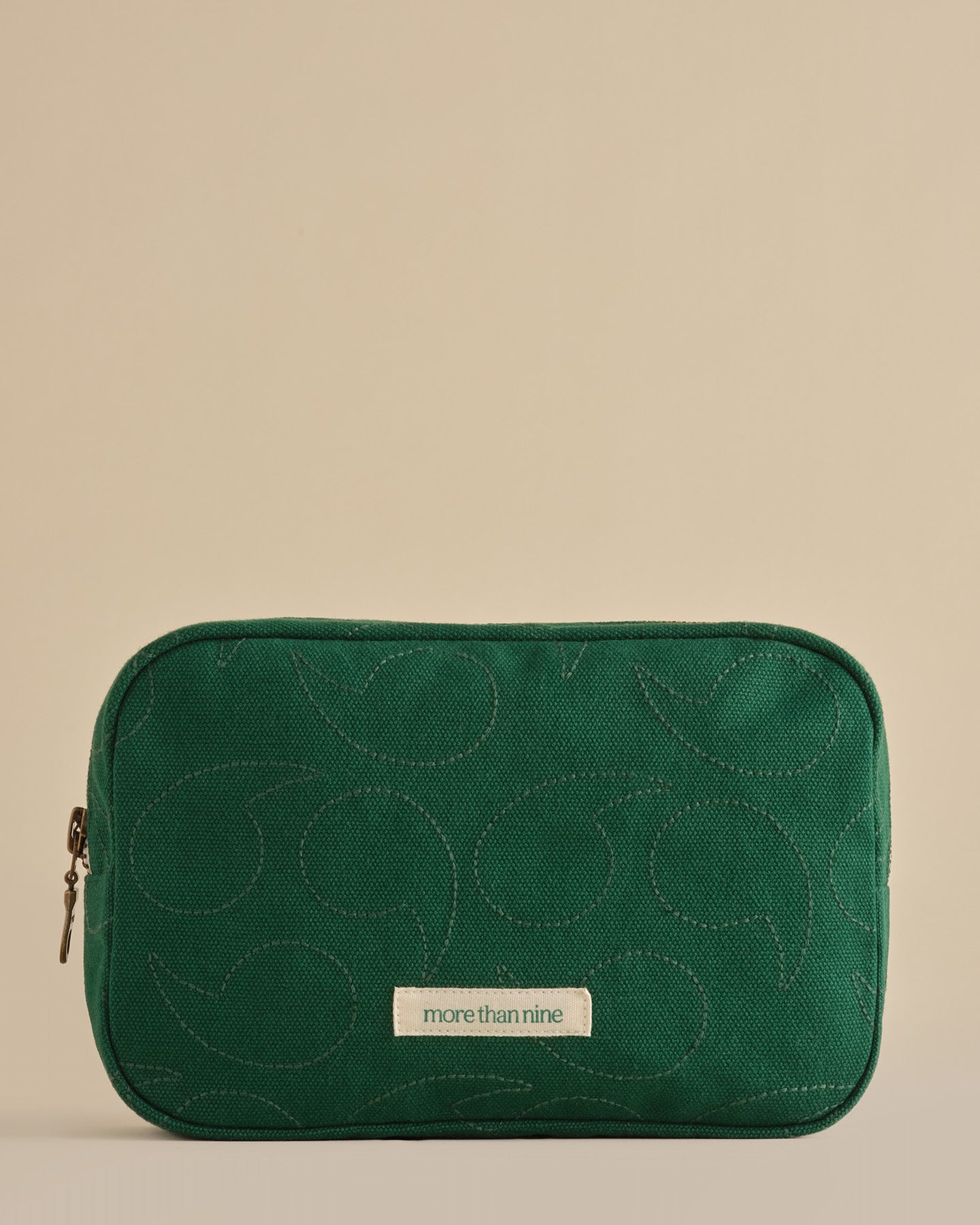 The You Did It Bag green hospital pouch on a neutral background
